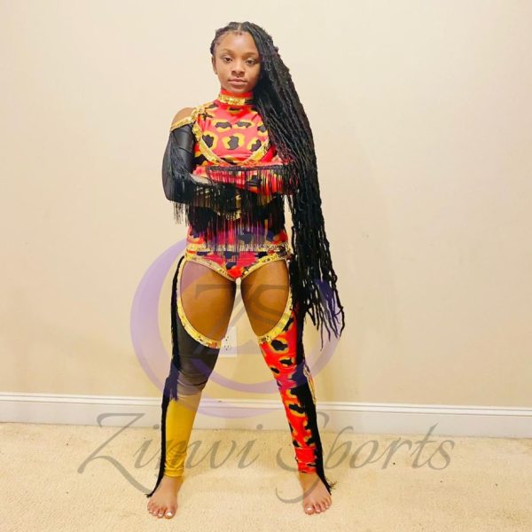 Stylish red and white majorette uniform with sequin details and pleated skirt.