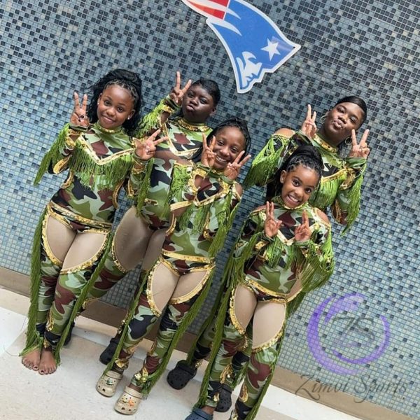 Stylish red and white majorette uniform with sequin details and pleated skirt.